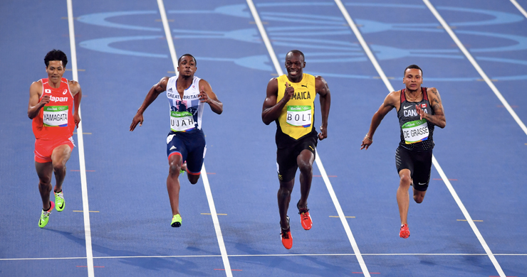 In terza corsia, Usain Bolt durante la semifinale dei cento metri alle Olimpiadi di Rio 2016 (Shutterstock)